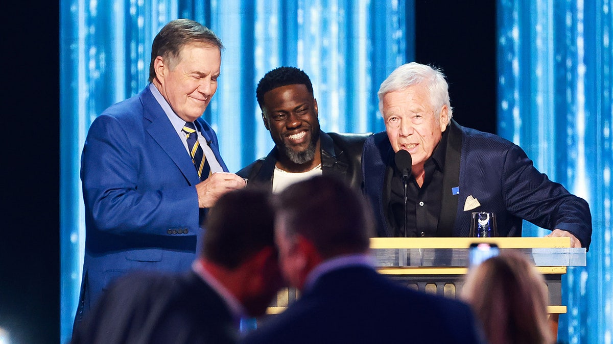 Robert Kraft and Bill Belichick and Kevin Hart